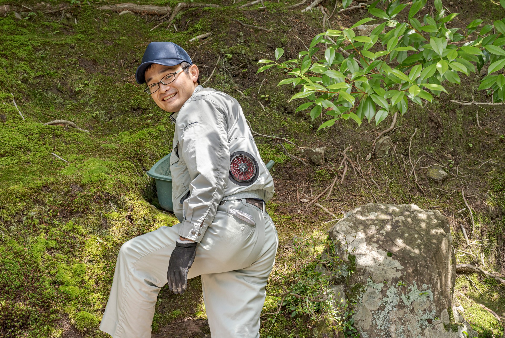 Portrait of a smiling Japanese gardener.